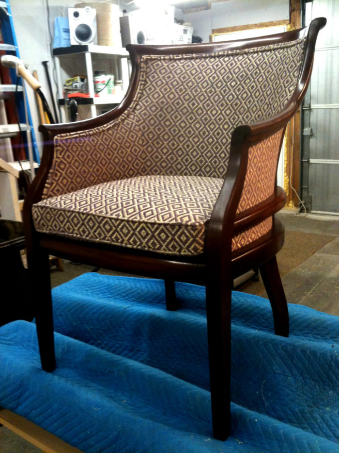 Patterned occasional chair from Milton after being reupholstered