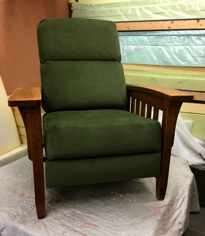 Reupholstered green recliner chair from Milton